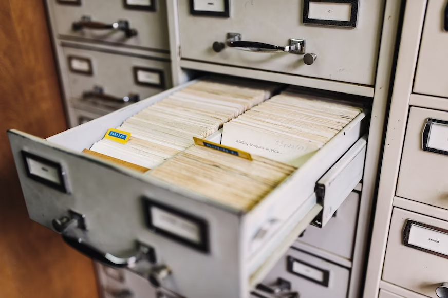 A meticulously organized drawer containing an assortment of files and folders neatly arranged for easy access and efficient storage.png